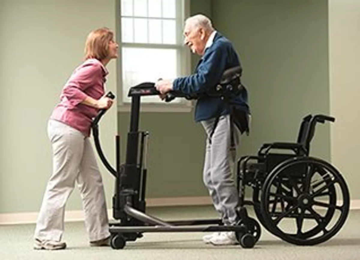 Pulse Home Health therapist assisting a patient with in-home rehabilitation equipment